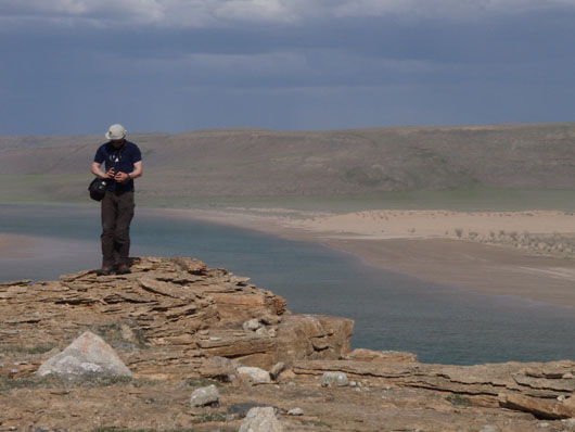 Markus on top of ELM along the Hornaday River, July 2007. Photo by Delia.